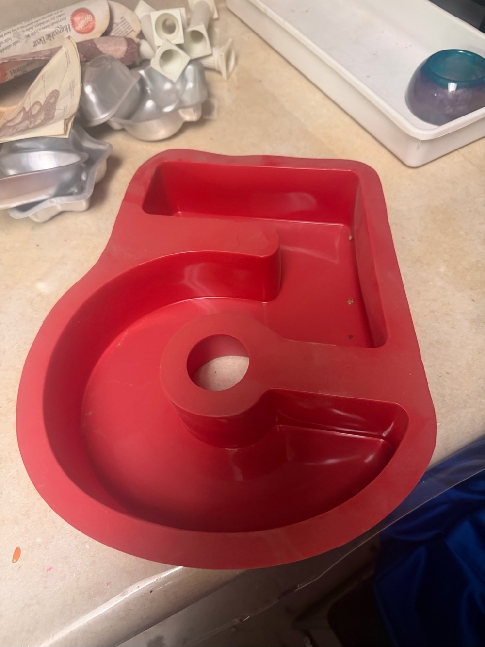 Red silicone cake pan.